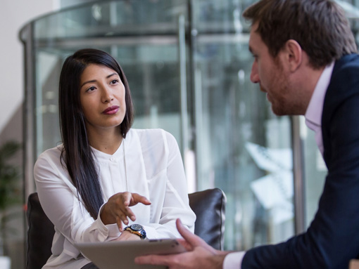 Two people having a business discussion.